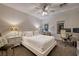 Comfortable bedroom with a queen-size bed and a workspace at 38 Strada Principale, Henderson, NV 89011