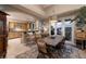 Rustic dining area adjacent to kitchen with access to patio at 38 Strada Principale, Henderson, NV 89011