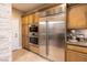 Kitchen boasts stainless steel appliances and ample storage at 38 Strada Principale, Henderson, NV 89011