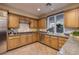 Modern kitchen with stainless steel appliances at 38 Strada Principale, Henderson, NV 89011