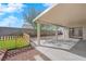 Relaxing backyard patio area with a partial cover, offering a blend of shade and sunlight for outdoor enjoyment at 3923 Gramercy Ave, North Las Vegas, NV 89031