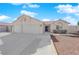 Charming single-story home with a three-car garage and well-maintained landscaping in a sunny neighborhood at 3923 Gramercy Ave, North Las Vegas, NV 89031