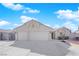 Charming single-story home with a three-car garage and a well-maintained front yard at 3923 Gramercy Ave, North Las Vegas, NV 89031