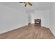 Bright living room features wood-look floors and a stone fireplace focal point at 3923 Gramercy Ave, North Las Vegas, NV 89031