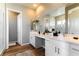 Bright bathroom with double sink vanity, lots of counter space, and framed mirror at 4342 Guava Ct # 0, Las Vegas, NV 89135