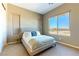 Bedroom featuring large window providing plenty of natural light and great views at 4342 Guava Ct # 0, Las Vegas, NV 89135