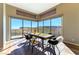 Bright dining area features hardwood floors and scenic views from a panoramic window at 4342 Guava Ct # 0, Las Vegas, NV 89135