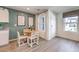 Bright dining area with table and chairs, adjacent to kitchen at 4949 Apple Mesa Ave # 213, Las Vegas, NV 89139