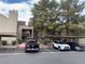 View of apartment building entrance and parking at 5046 S Rainbow Blvd # 103, Las Vegas, NV 89118