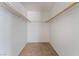 Walk-in closet with shelving and carpeted floor at 5046 S Rainbow Blvd # 103, Las Vegas, NV 89118