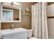 Clean bathroom with a shower/tub combo, vanity, and white fixtures at 5448 Red Sun Dr, Las Vegas, NV 89149