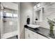 Modern bathroom with a walk-in shower, vessel sink, and stylish tile at 5448 Red Sun Dr, Las Vegas, NV 89149