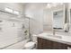 Bathroom with tub, shower, and modern vanity with quartz countertop at 5860 Noah Springs Ct, Las Vegas, NV 89149