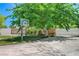 Backyard with basketball court and large shade tree at 5880 W Oquendo Rd, Las Vegas, NV 89118