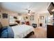 Main bedroom with a queen bed, mirrored closet doors, and ceiling fan at 6232 Lanning Ln, Las Vegas, NV 89108