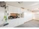 Organized garage with white cabinets and ample storage space at 6232 Lanning Ln, Las Vegas, NV 89108