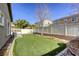 Artificial turf putting green and fenced backyard at 6232 Novak St, Las Vegas, NV 89115