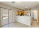 Bright kitchen with stainless steel appliances and light wood cabinets at 6232 Novak St, Las Vegas, NV 89115