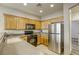 Modern kitchen featuring stainless steel appliances and ample cabinetry at 6232 Novak St, Las Vegas, NV 89115