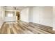 Spacious living room with wood-look floors and neutral walls at 6232 Novak St, Las Vegas, NV 89115