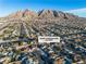 Aerial view of a charming community with stunning mountain views at 6255 Adenmoor Ct, Las Vegas, NV 89156