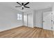 Bedroom featuring a ceiling fan, closet, and natural light from window at 6255 Adenmoor Ct, Las Vegas, NV 89156