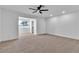 Spacious main bedroom with a contemporary ceiling fan and ample natural light at 6255 Adenmoor Ct, Las Vegas, NV 89156