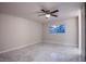 Bright bedroom with tile floors and ceiling fan at 6584 Banbridge Dr, Las Vegas, NV 89103