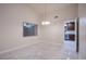 Open concept dining room with marble floors and kitchen views at 6584 Banbridge Dr, Las Vegas, NV 89103