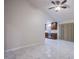 Dining area with marble floors, ceiling fan and kitchen access at 6584 Banbridge Dr, Las Vegas, NV 89103