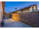 Side yard with gate and block wall at 6584 Banbridge Dr, Las Vegas, NV 89103