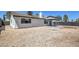 Large backyard with patio and fire pit area at 7205 Carrondale Way, Las Vegas, NV 89128