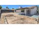 Large backyard with patio and circular garden at 7205 Carrondale Way, Las Vegas, NV 89128