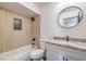 Updated bathroom with granite vanity and tub at 7205 Carrondale Way, Las Vegas, NV 89128