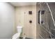 Clean bathroom with a walk-in shower and toilet at 7205 Carrondale Way, Las Vegas, NV 89128