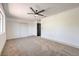 Bright bedroom with ceiling fan and double closets at 7205 Carrondale Way, Las Vegas, NV 89128