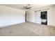 Main bedroom with barn door entry to ensuite bathroom with soaking tub at 7205 Carrondale Way, Las Vegas, NV 89128