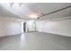 Spacious garage with freshly painted floor at 7205 Carrondale Way, Las Vegas, NV 89128