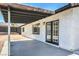 Covered patio with double doors and concrete flooring at 7205 Carrondale Way, Las Vegas, NV 89128