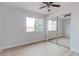 Bedroom with mirrored closet and ceiling fan at 7445 Shangri La Ave, Las Vegas, NV 89147