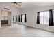 Primary bedroom with mirrored closet and ceiling fan at 7445 Shangri La Ave, Las Vegas, NV 89147