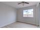 Light-filled bedroom with hardwood floors and a window view at 7445 Shangri La Ave, Las Vegas, NV 89147