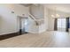 Dining area with hardwood floors and a modern chandelier at 7445 Shangri La Ave, Las Vegas, NV 89147