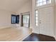 Light and airy living room with hardwood floors and large windows at 7445 Shangri La Ave, Las Vegas, NV 89147