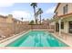 Relaxing pool area with surrounding homes visible at 7445 Shangri La Ave, Las Vegas, NV 89147