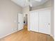 Cozy bedroom features a ceiling fan and sliding closet doors at 8474 Orange Cliff Ct, Las Vegas, NV 89123