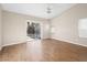 Bright bedroom with sliding glass door and views of the pool at 8474 Orange Cliff Ct, Las Vegas, NV 89123