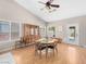 Bright dining room featuring hardwood floors and a ceiling fan at 8474 Orange Cliff Ct, Las Vegas, NV 89123