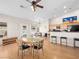 Open dining area with hardwood floors and kitchen access at 8474 Orange Cliff Ct, Las Vegas, NV 89123