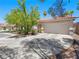 Charming house exterior with a two-car garage at 8474 Orange Cliff Ct, Las Vegas, NV 89123